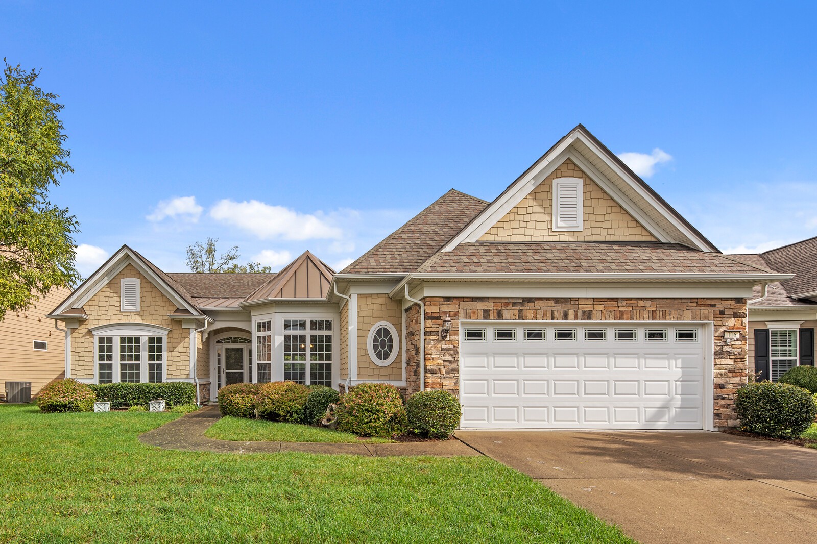 116 Dahlgren Drive Mount Juliet, TN 37122 - Photo 1 of 20 a front view of a house with a garden and yard