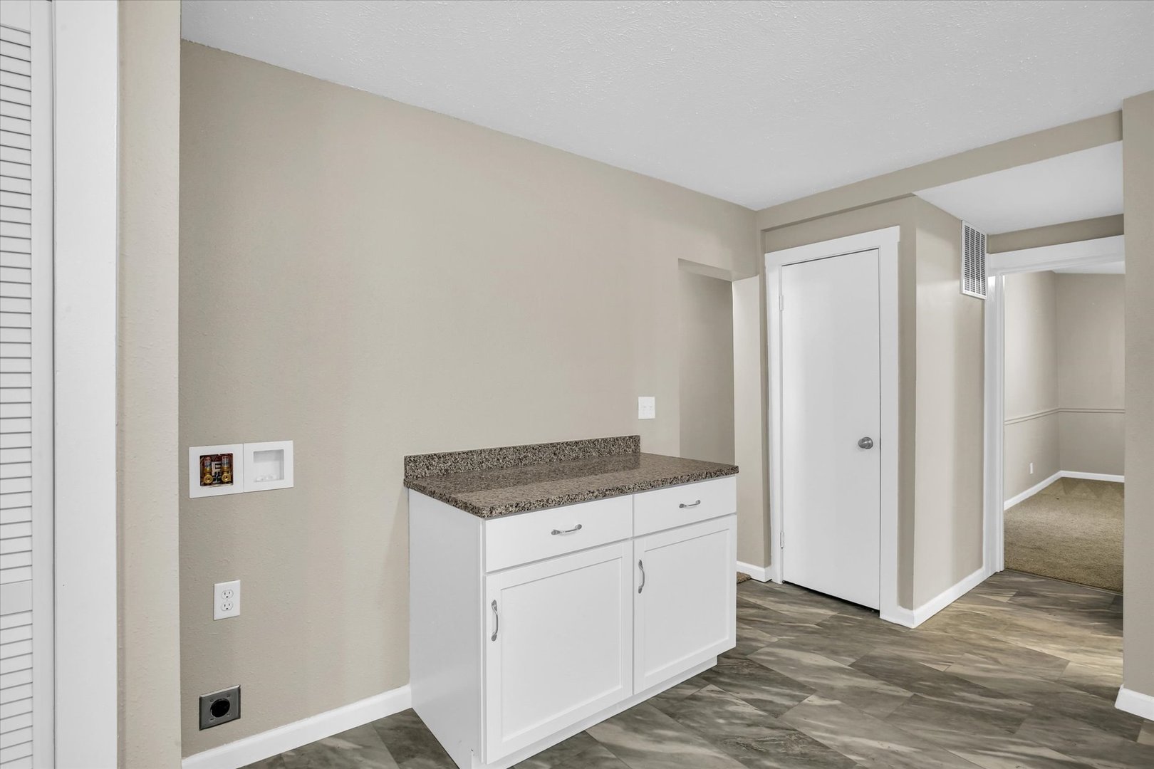 305 East Main Street Ogden, IL 61859 - Photo 17 of 31 a hallway with cabinets