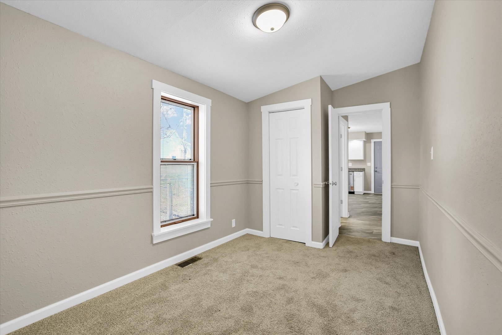 305 East Main Street Ogden, IL 61859 - Photo 21 of 31 an empty room with windows and closet