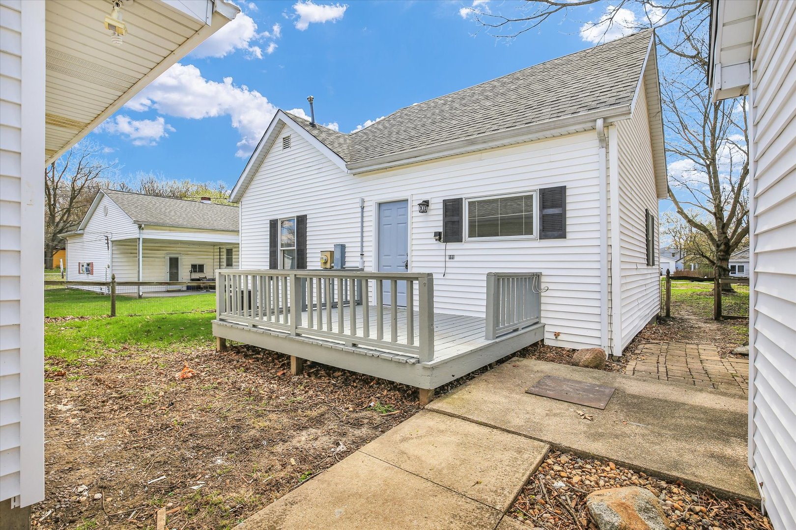305 East Main Street Ogden, IL 61859 - Photo 23 of 31 a view of a house with a yard