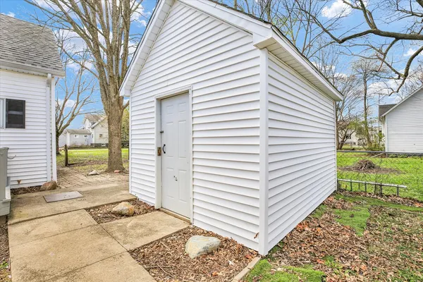 a view of a back yard of the house