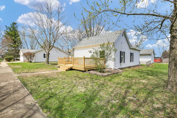 a view of a house with a yard