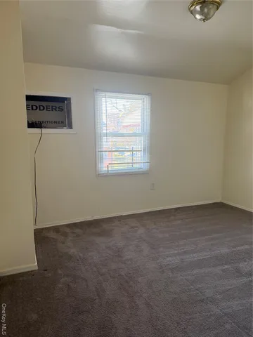 an empty room with a workbench