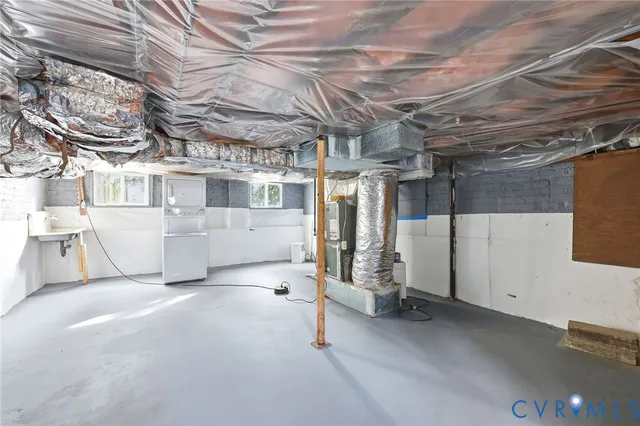 a view of a yard with a tree in the background