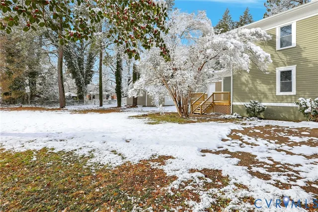 a front view of a building with a yard