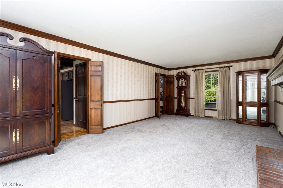 3177 Pickle Road Akron, OH 44312 - Photo 14 of 32 Living room from the patio door that leads to the deck.