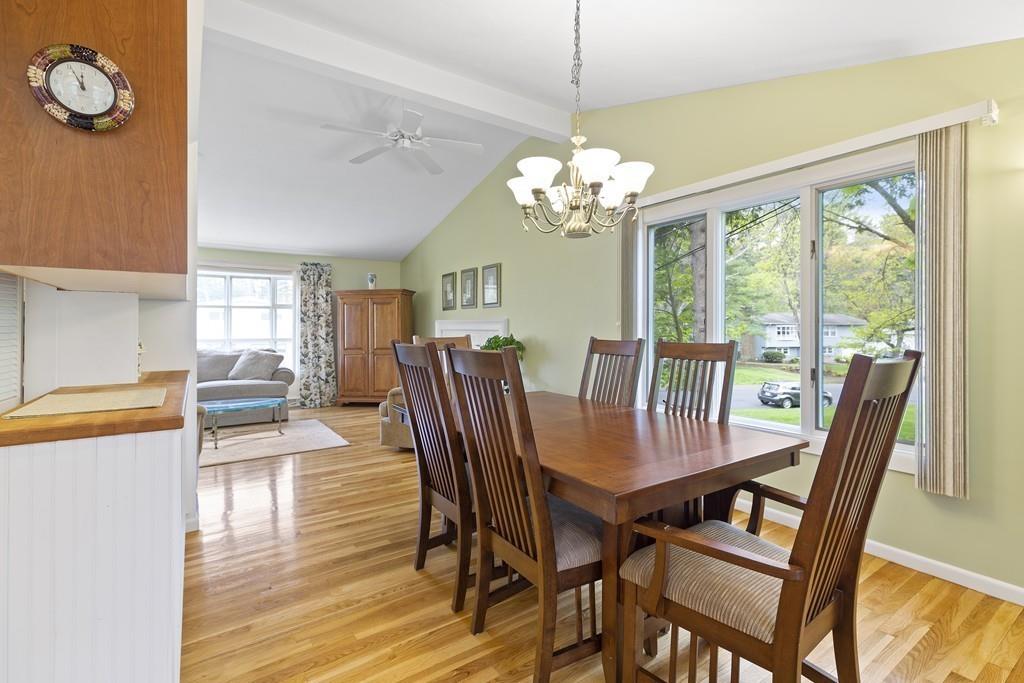 54 Joyce Road Framingham, MA 01701 - Photo 11 of 42 a view of a dining room with furniture wooden floor and chandelier