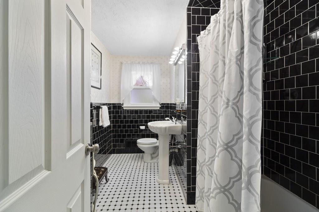 54 Joyce Road Framingham, MA 01701 - Photo 27 of 42 a bathroom with a sink toilet and shower