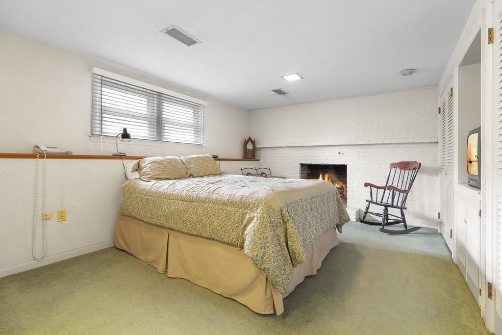 54 Joyce Road Framingham, MA 01701 - Photo 28 of 42 a bedroom with a bed and window