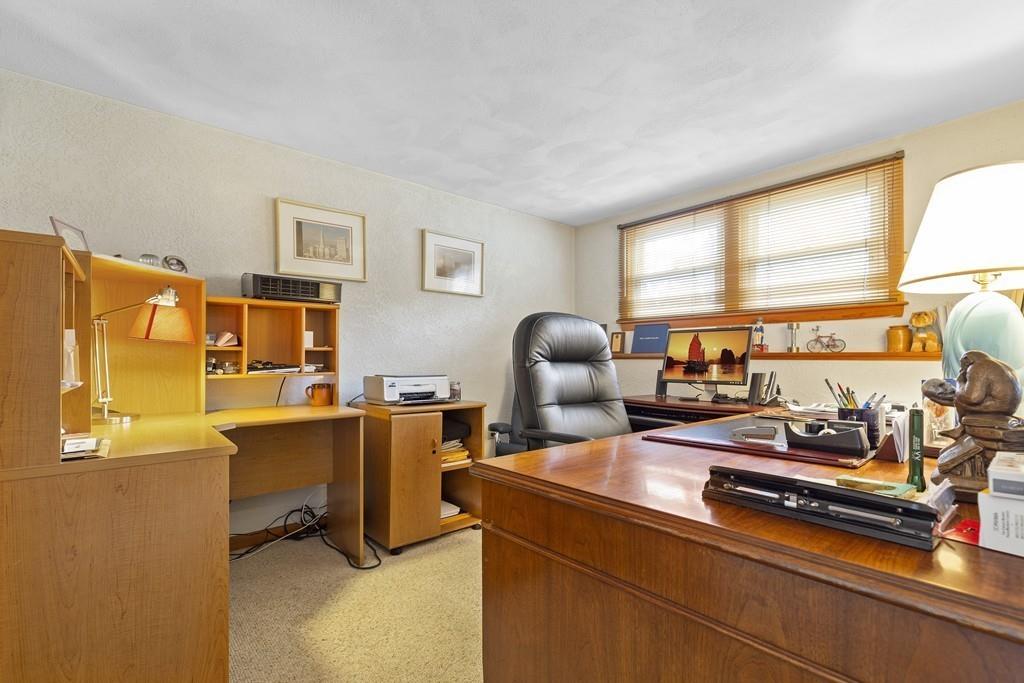 54 Joyce Road Framingham, MA 01701 - Photo 30 of 42 a view of a workspace with furniture and a window