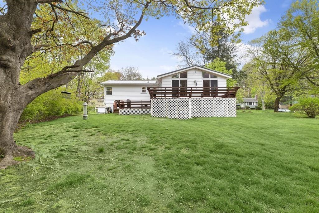 54 Joyce Road Framingham, MA 01701 - Photo 35 of 42 a front view of a house with a yard