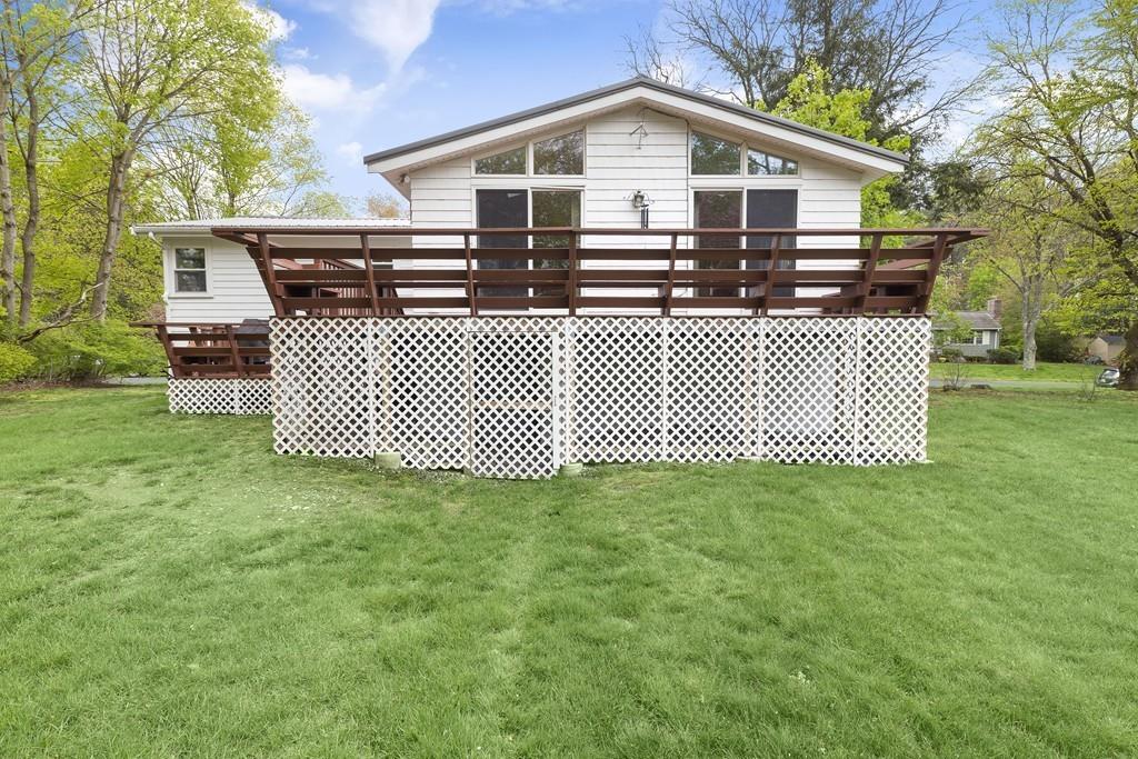 54 Joyce Road Framingham, MA 01701 - Photo 37 of 42 a front view of a house with a yard
