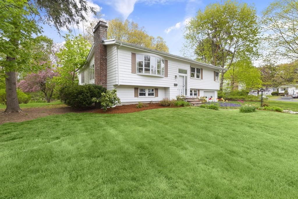 54 Joyce Road Framingham, MA 01701 - Photo 4 of 42 a house view with a garden space