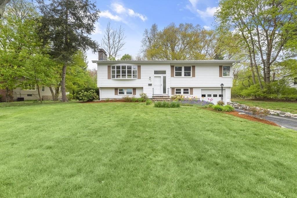 54 Joyce Road Framingham, MA 01701 - Photo 6 of 42 a view of a house with a big yard and large trees