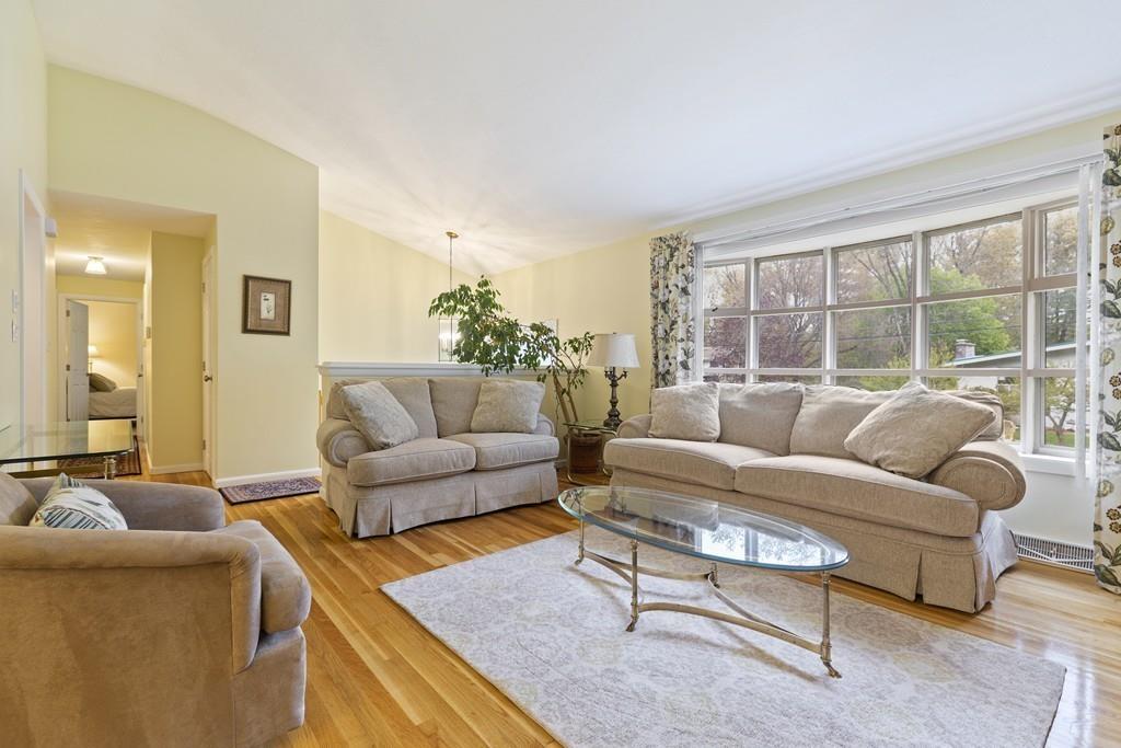 54 Joyce Road Framingham, MA 01701 - Photo 8 of 42 a living room with furniture and a large window