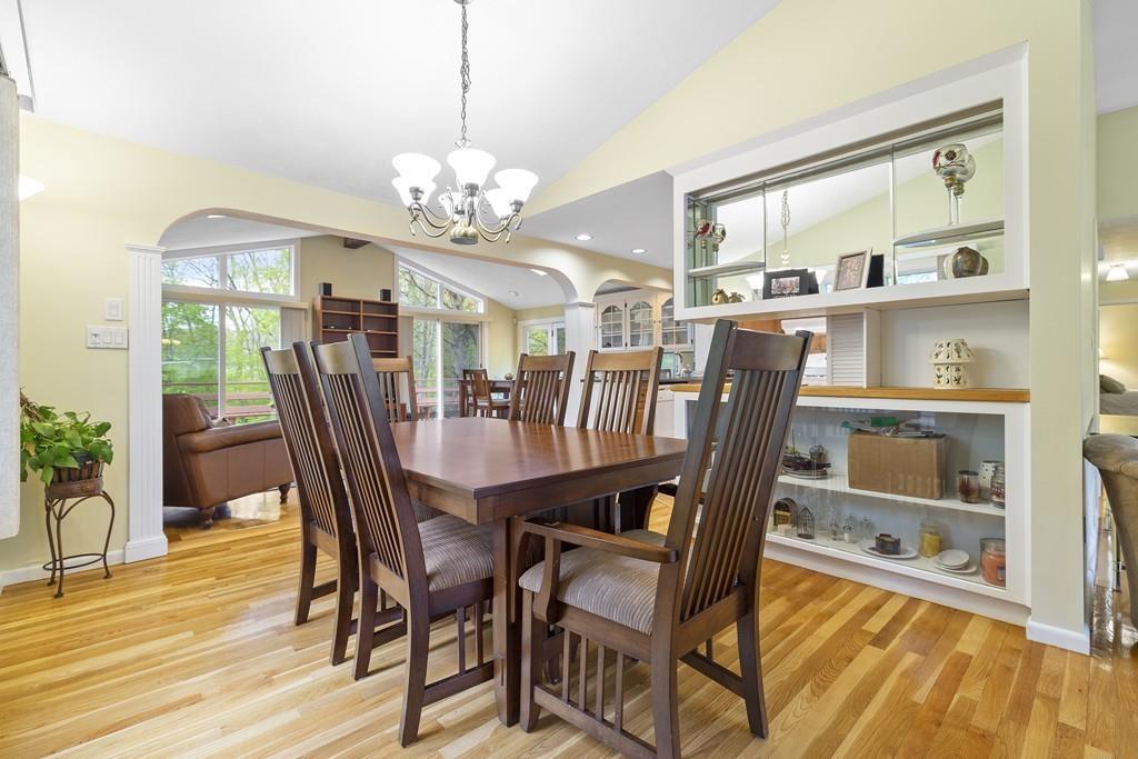 54 Joyce Road Framingham, MA 01701 - Photo 10 of 42 a view of a dining room with furniture and wooden floor