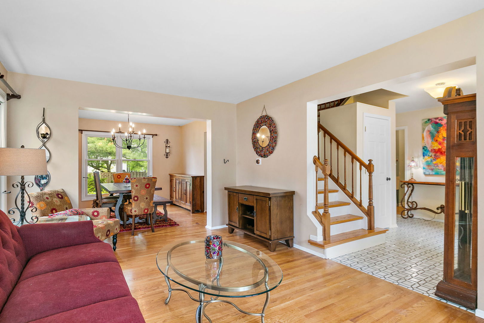 112 Thompson Boulevard Buffalo Grove, IL 60089 - Photo 3 of 34 a living room with furniture and a fireplace