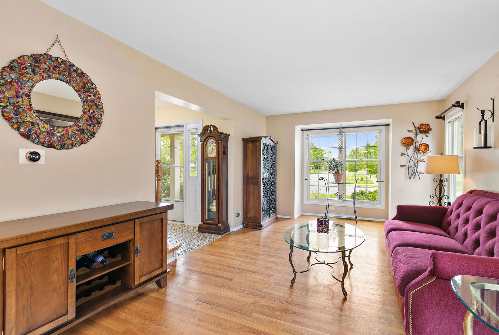112 Thompson Boulevard Buffalo Grove, IL 60089 - Photo 5 of 34 a living room with furniture and a wooden floor