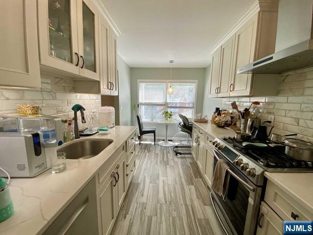 144 Panorama Drive Edgewater, NJ 07020 - Photo 7 of 10 a kitchen with sink a stove and cabinets