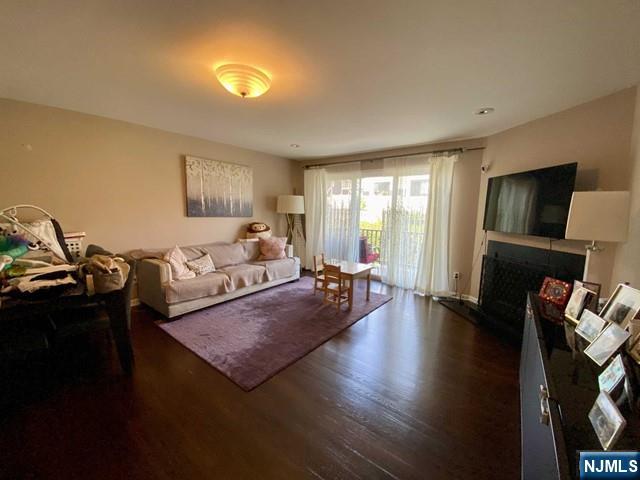 144 Panorama Drive Edgewater, NJ 07020 - Photo 9 of 10 a living room with furniture and a flat screen tv