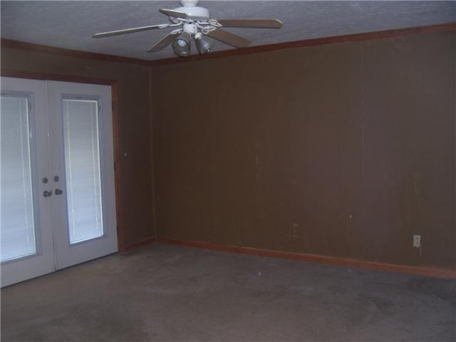 424 Bold Springs Road McEwen, TN 37101 - Photo 13 of 18 family room with doors to patio