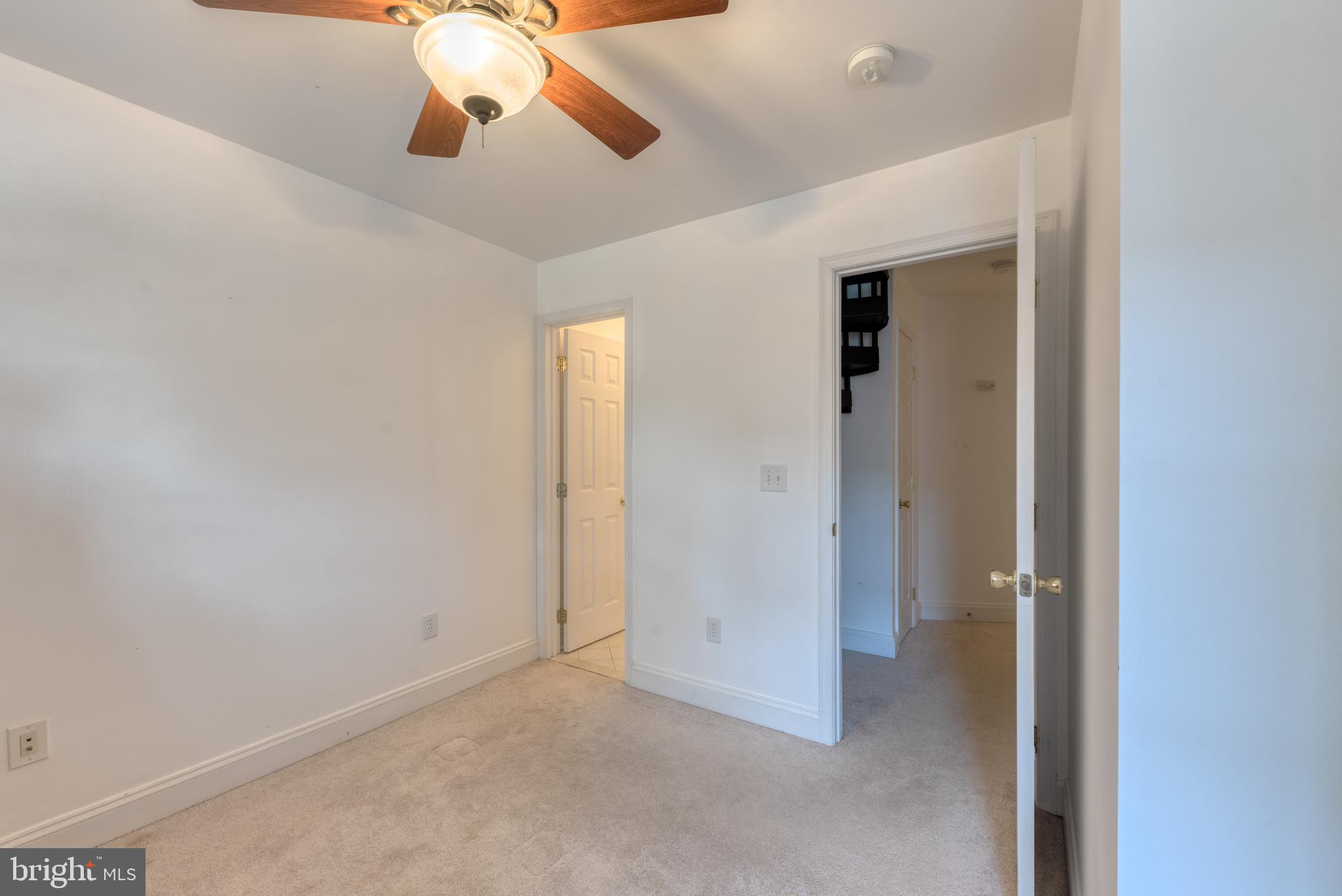 1818 Bank Street Baltimore, MD 21231 - Photo 13 of 20 a view of a chandelier fan and closet in a room