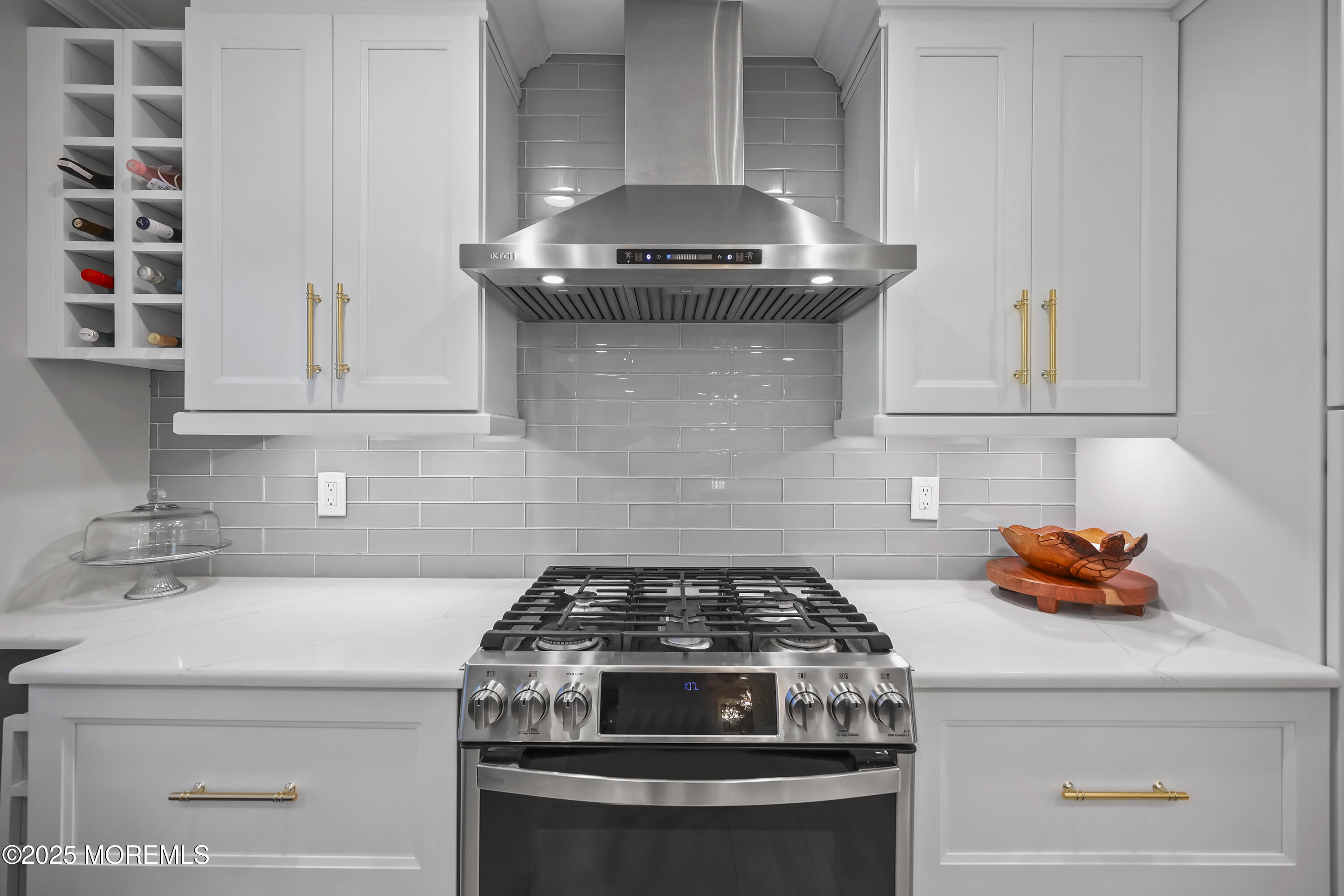 22 Riley Road Morganville, NJ 07751 - Photo 12 of 28 a stove top oven sitting inside of a kitchen