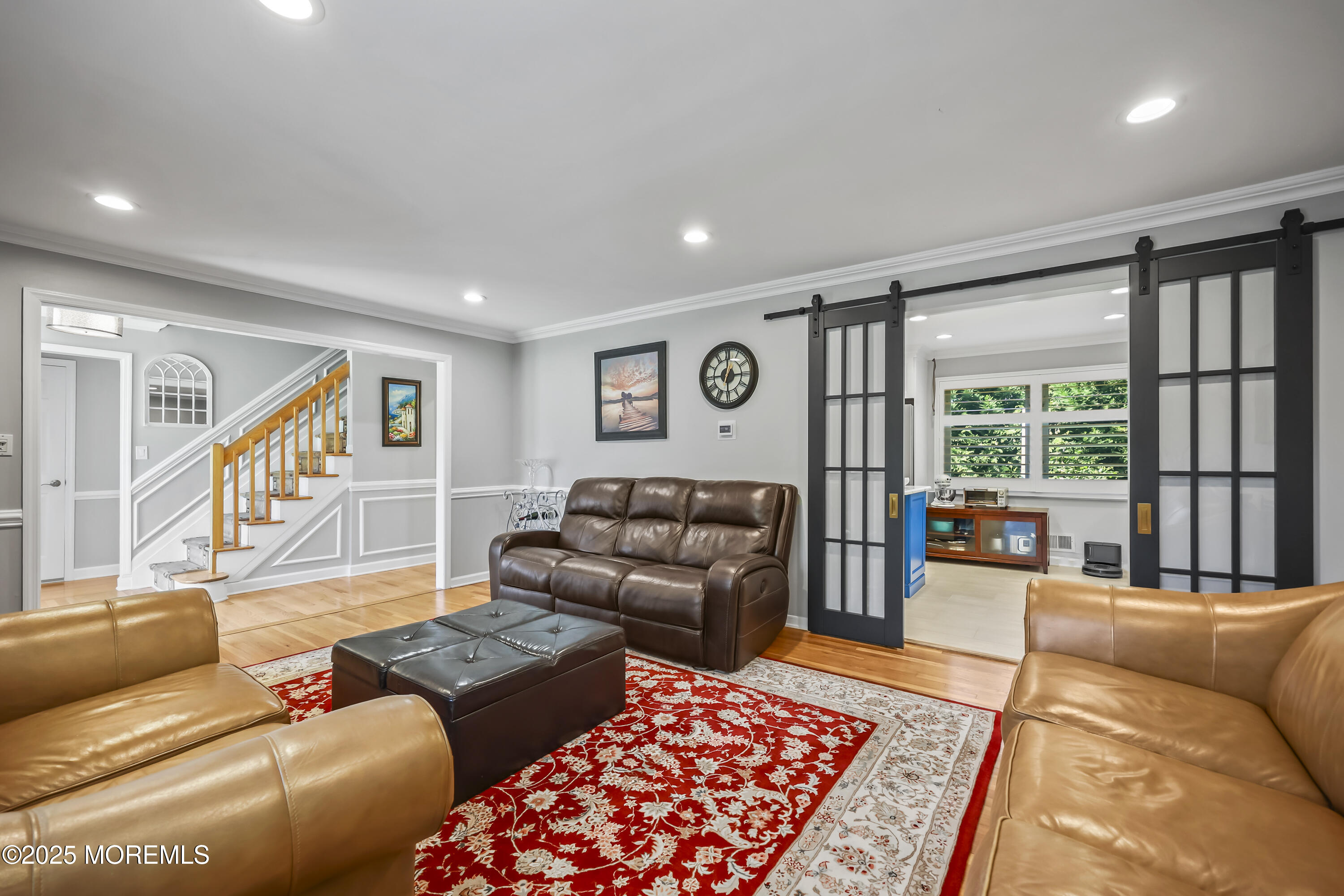 22 Riley Road Morganville, NJ 07751 - Photo 7 of 28 a living room with furniture and a rug
