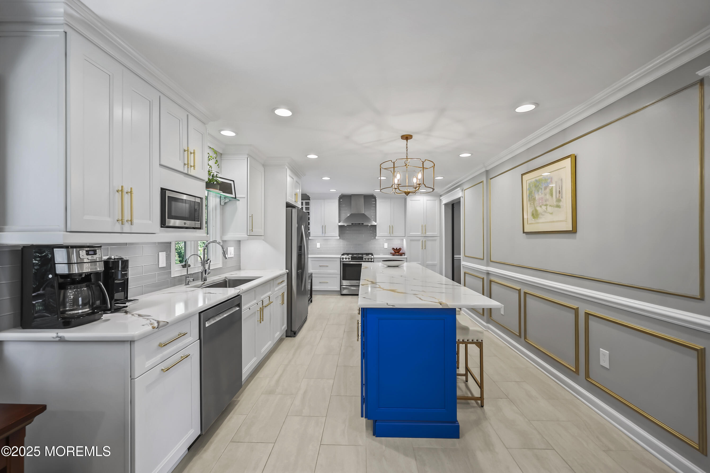 22 Riley Road Morganville, NJ 07751 - Photo 8 of 28 a large kitchen with stainless steel appliances lots of counter top space