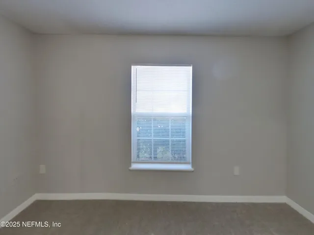 a view of a small space with a window