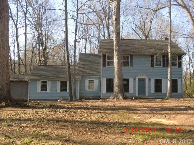 4008 Wynbrook Way Monroe, NC 28112 - Photo 1 of 15 a front view of a house with a yard