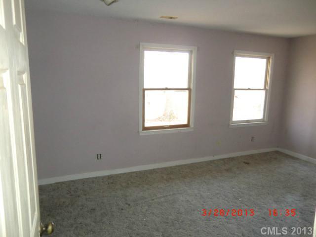 4008 Wynbrook Way Monroe, NC 28112 - Photo 11 of 15 an empty room with a window