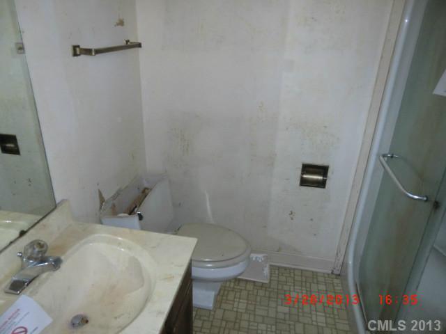 4008 Wynbrook Way Monroe, NC 28112 - Photo 14 of 15 a bathroom with a sink and toilet