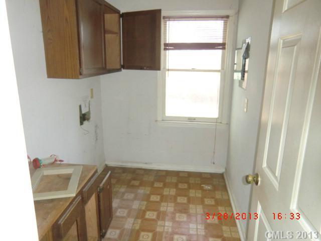 4008 Wynbrook Way Monroe, NC 28112 - Photo 7 of 15 a bathroom with a sink and a shower