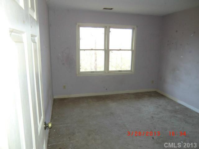 4008 Wynbrook Way Monroe, NC 28112 - Photo 9 of 15 an empty room with a window