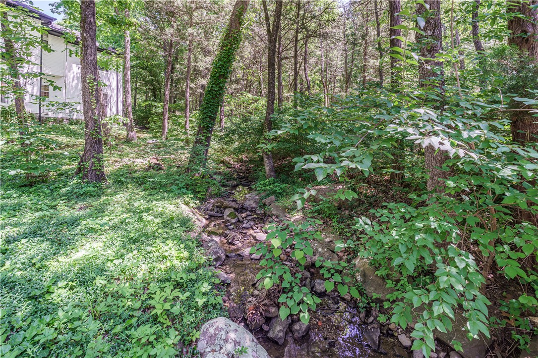 5723 Estate View Road Fayetteville, AR 72703 - Photo 33 of 39 Backyard fun with the creek!