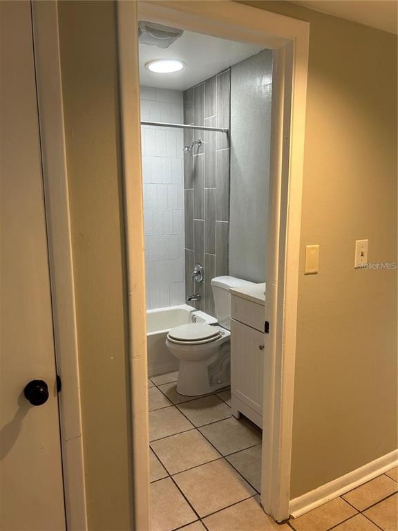 232 Beverly Boulevard Brandon, FL 33511 - Photo 23 of 32 a bathroom with a sink a toilet and shower