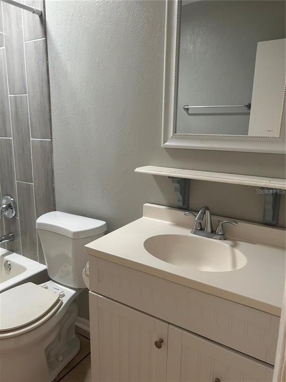 232 Beverly Boulevard Brandon, FL 33511 - Photo 24 of 32 a bathroom with a sink and a toilet