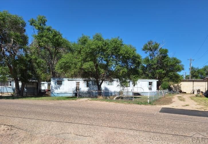 503 Division Street Lamar, CO 81052 - Photo 11 of 11 a view of street with houses