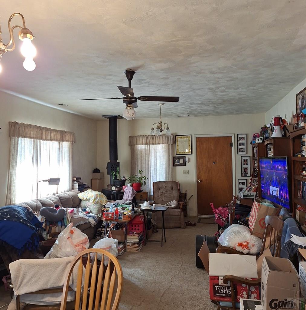 503 Division Street Lamar, CO 81052 - Photo 2 of 11 a living room with furniture and a window