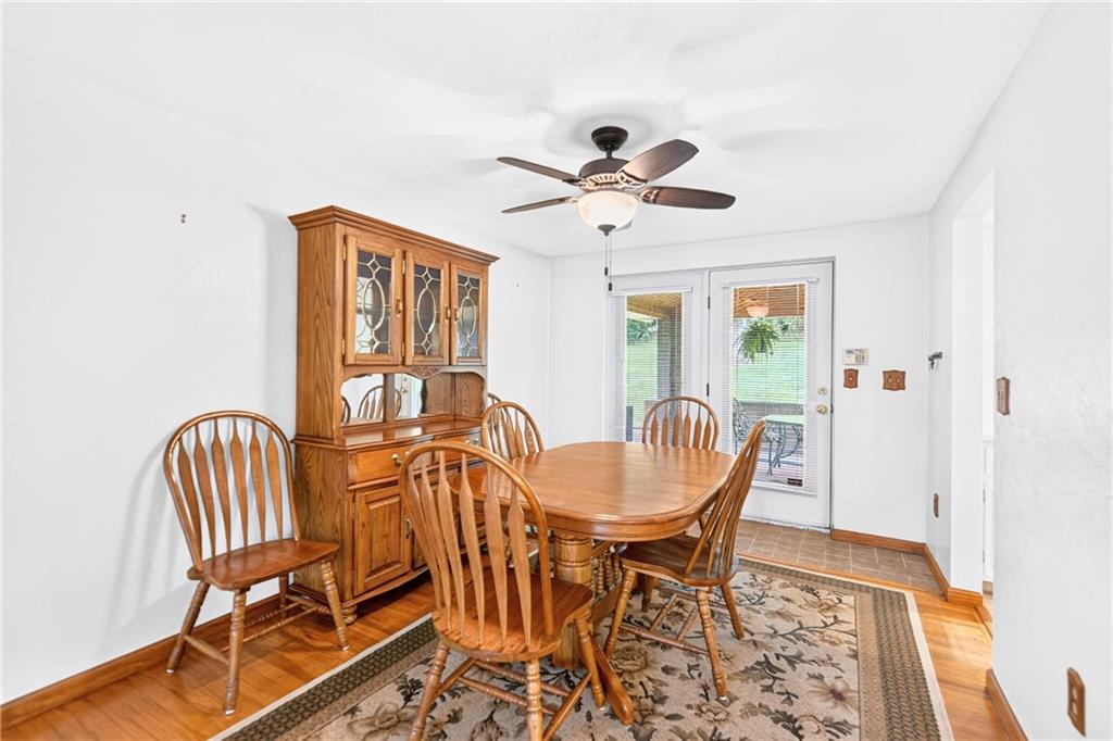 224 Bowman Road Bridgeville, PA 15017 - Photo 7 of 50 From the living room, you can flow right into the dining room. It's the perfect space for family and friends to gather and entertain!