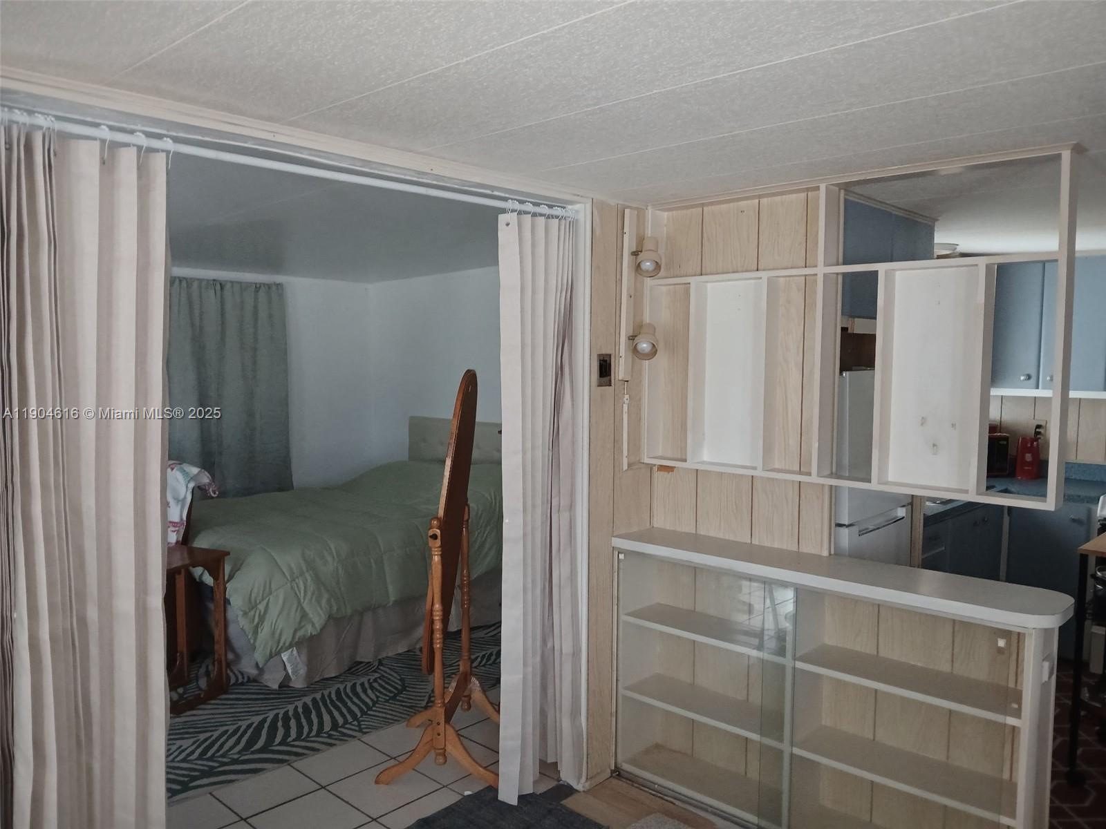 1860 Southwest 83rd Terrace Davie, FL 33324 - Photo 6 of 12 a bathroom with a shower and a sink