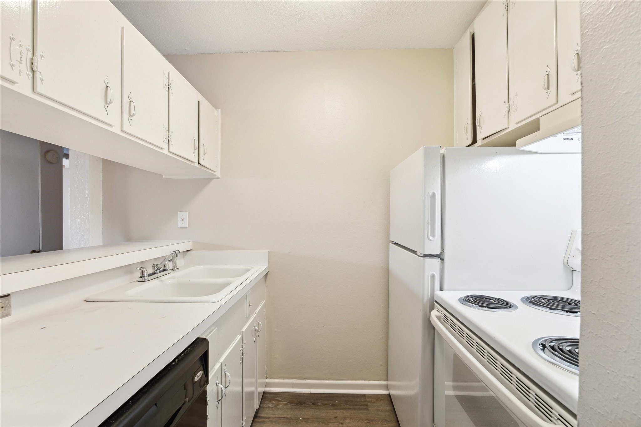 3259 Branard Street, Unit 7 Houston, TX 77098 - Photo 6 of 10 a utility room with cabinets washer and dryer