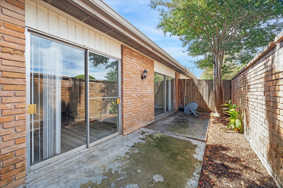 3259 Branard Street, Unit 7 Houston, TX 77098 - Photo 10 of 10 a backyard of a house with seating space