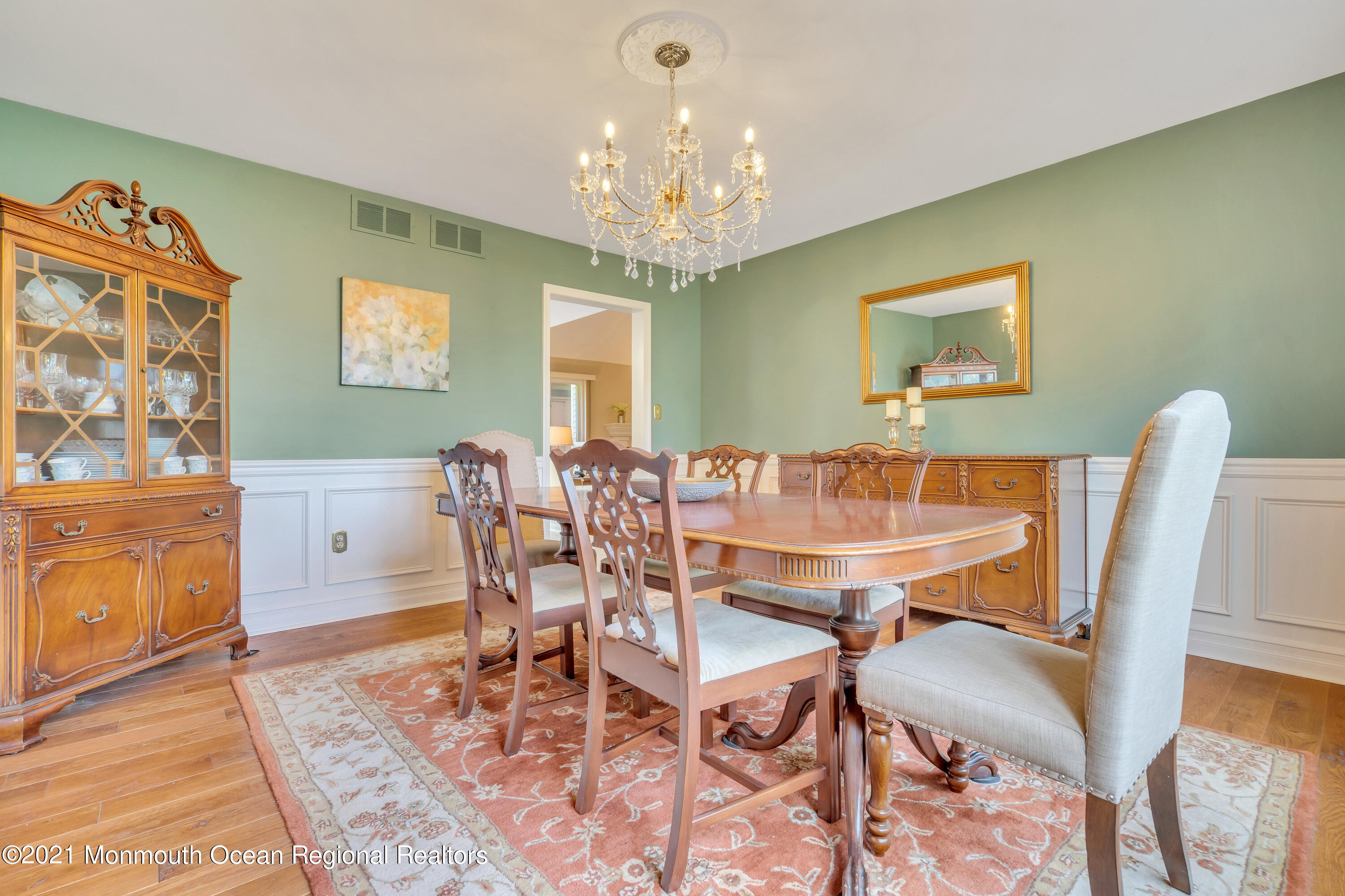 230 Crest Hill Road Toms River, NJ 08755 - Photo 11 of 59 a view of a dining room with furniture and chandelier