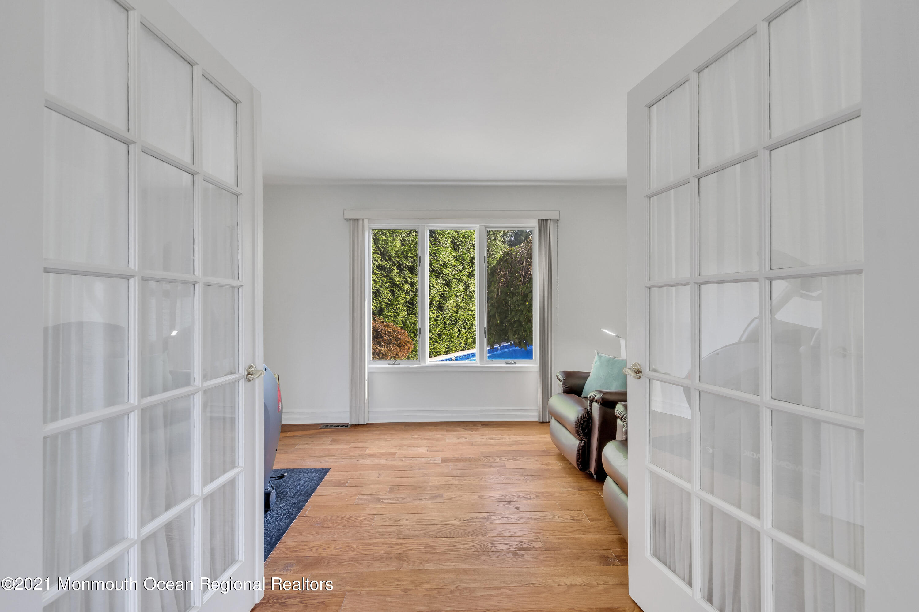 230 Crest Hill Road Toms River, NJ 08755 - Photo 16 of 59 a view of entryway with wooden floor and a rug