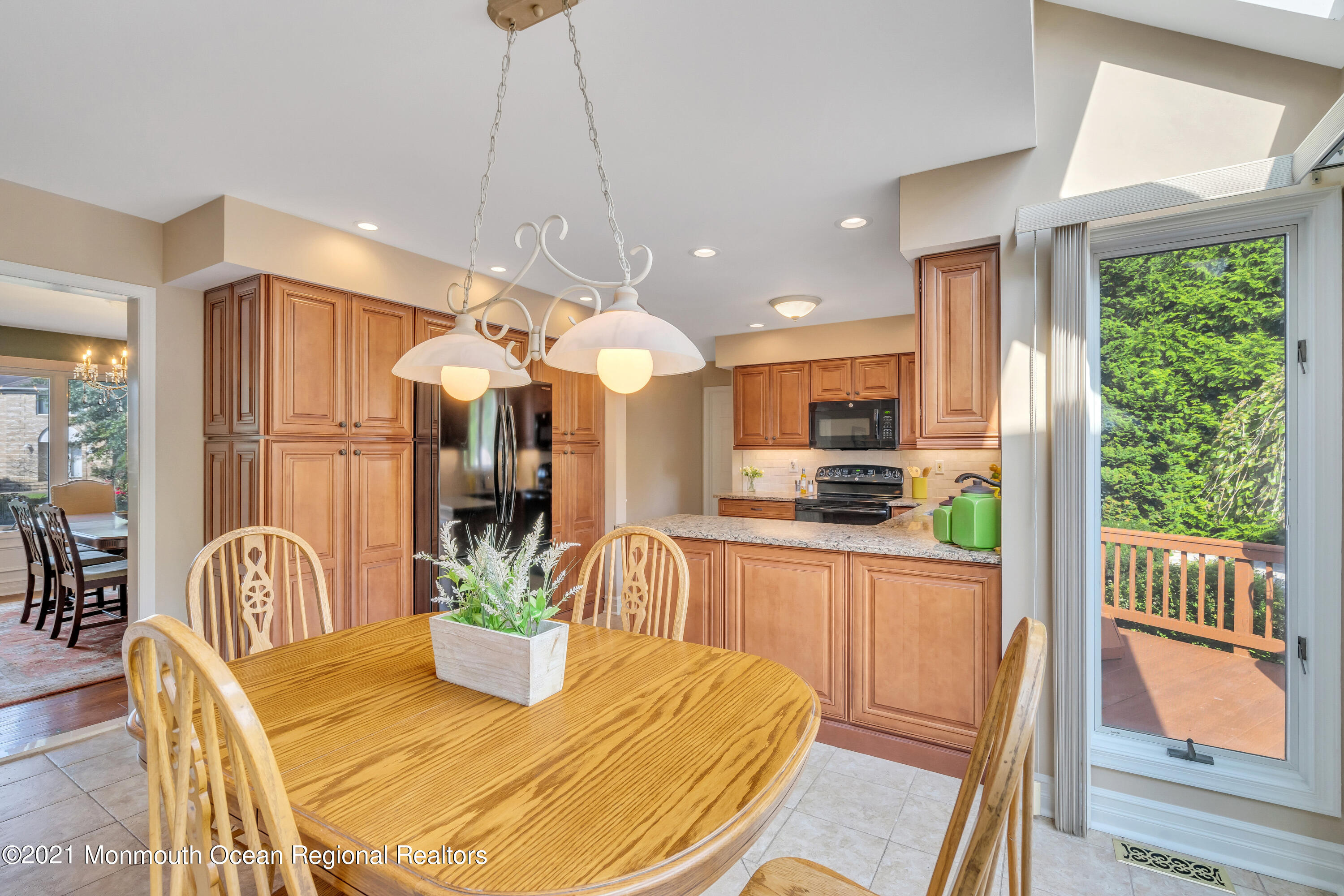 230 Crest Hill Road Toms River, NJ 08755 - Photo 20 of 59 a kitchen with a table and chairs