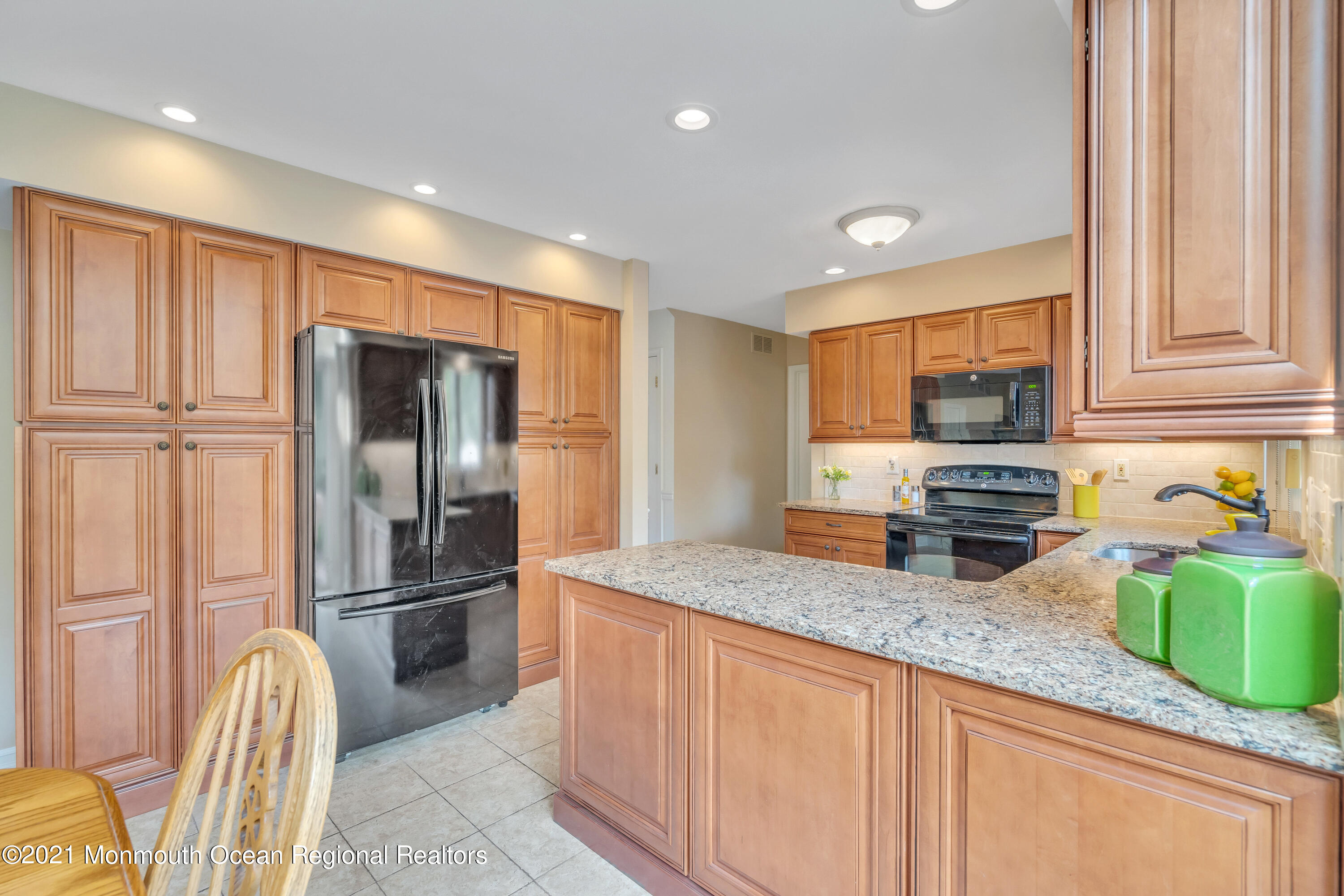 230 Crest Hill Road Toms River, NJ 08755 - Photo 21 of 59 a kitchen with granite countertop a refrigerator and a sink