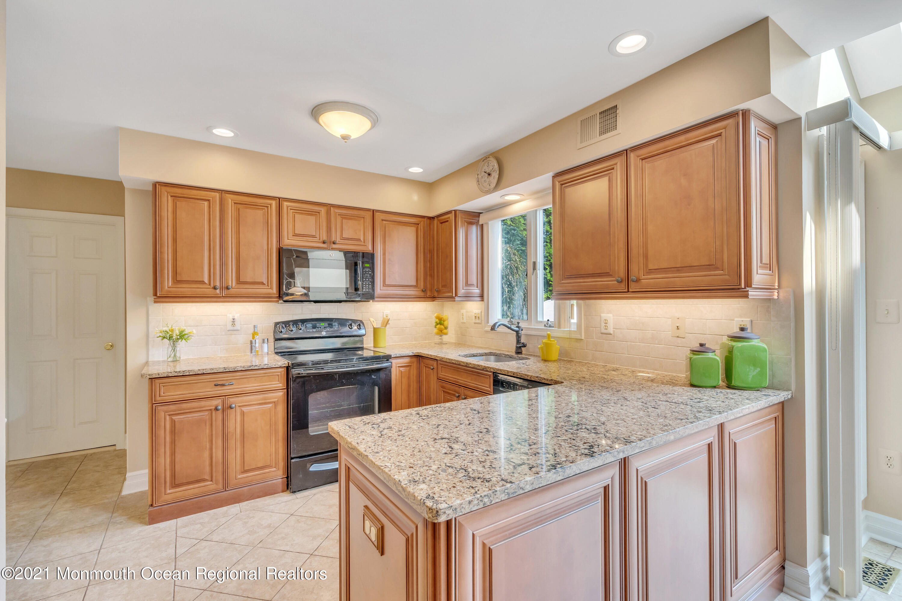230 Crest Hill Road Toms River, NJ 08755 - Photo 22 of 59 a kitchen with stainless steel appliances granite countertop a sink stove and refrigerator