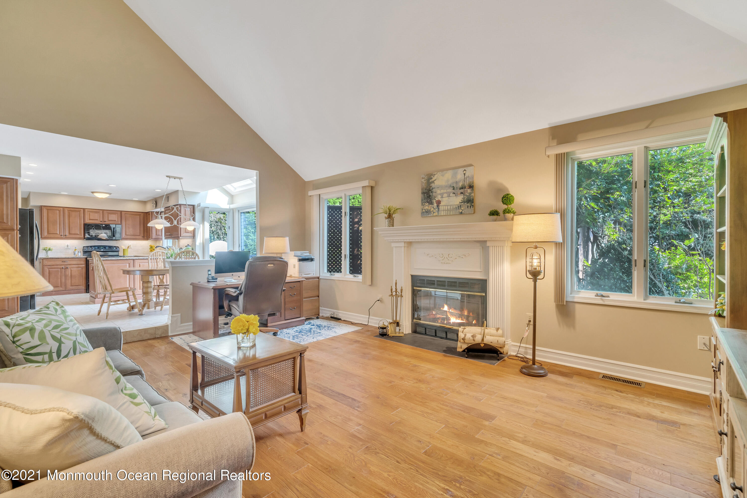 230 Crest Hill Road Toms River, NJ 08755 - Photo 27 of 59 a living room with furniture and a fireplace